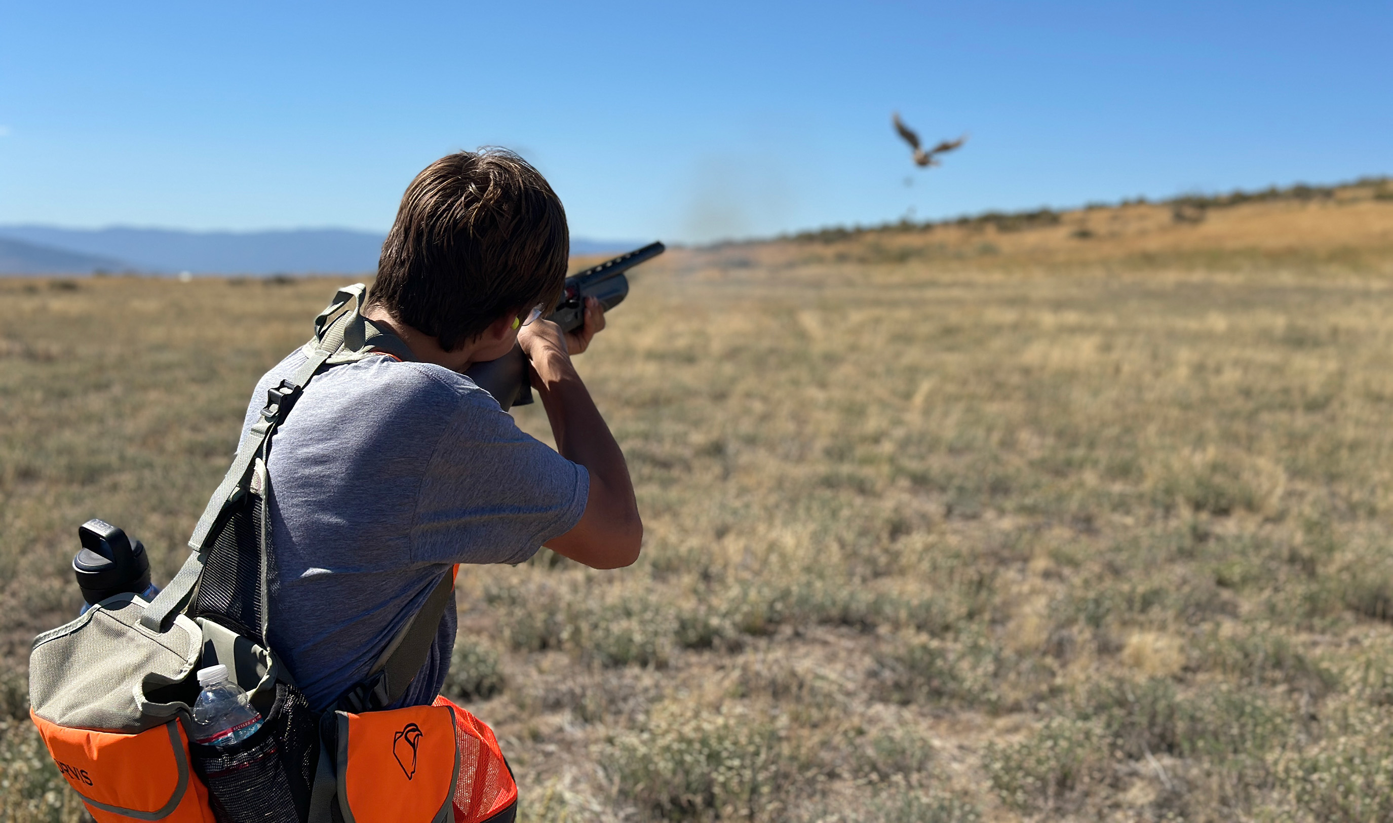 youth shooting a pheasant 